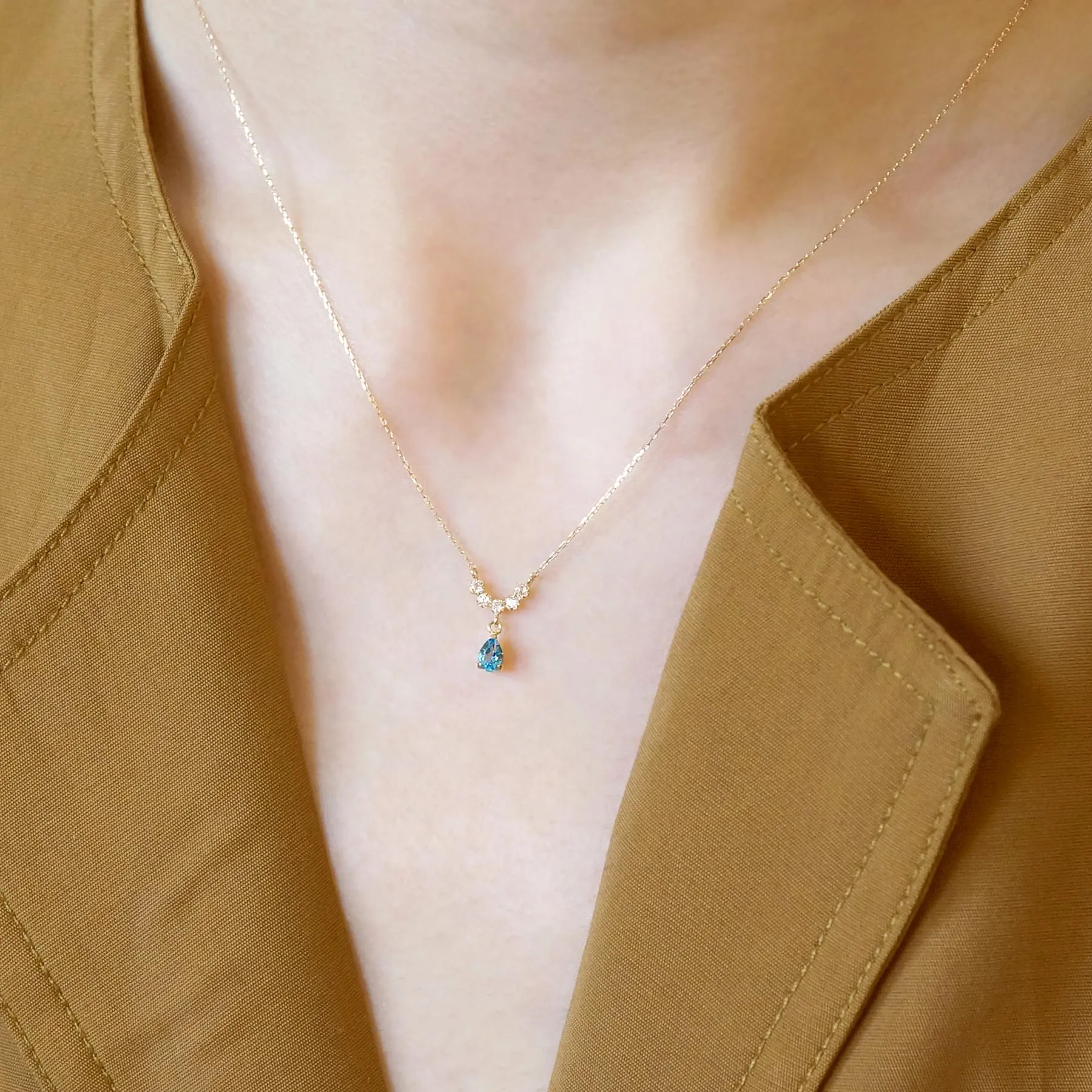 10K Yellow Gold Birthstone (Swiss Blue Topaz) Swinging Necklace