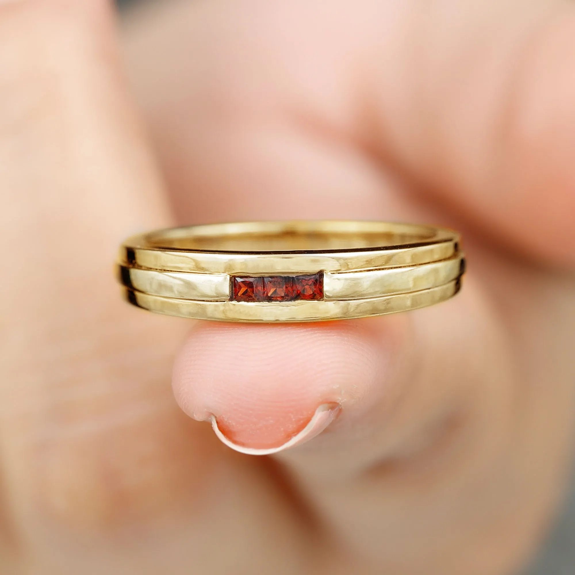 Gold Garnet Unisex Band Ring in Channel Setting