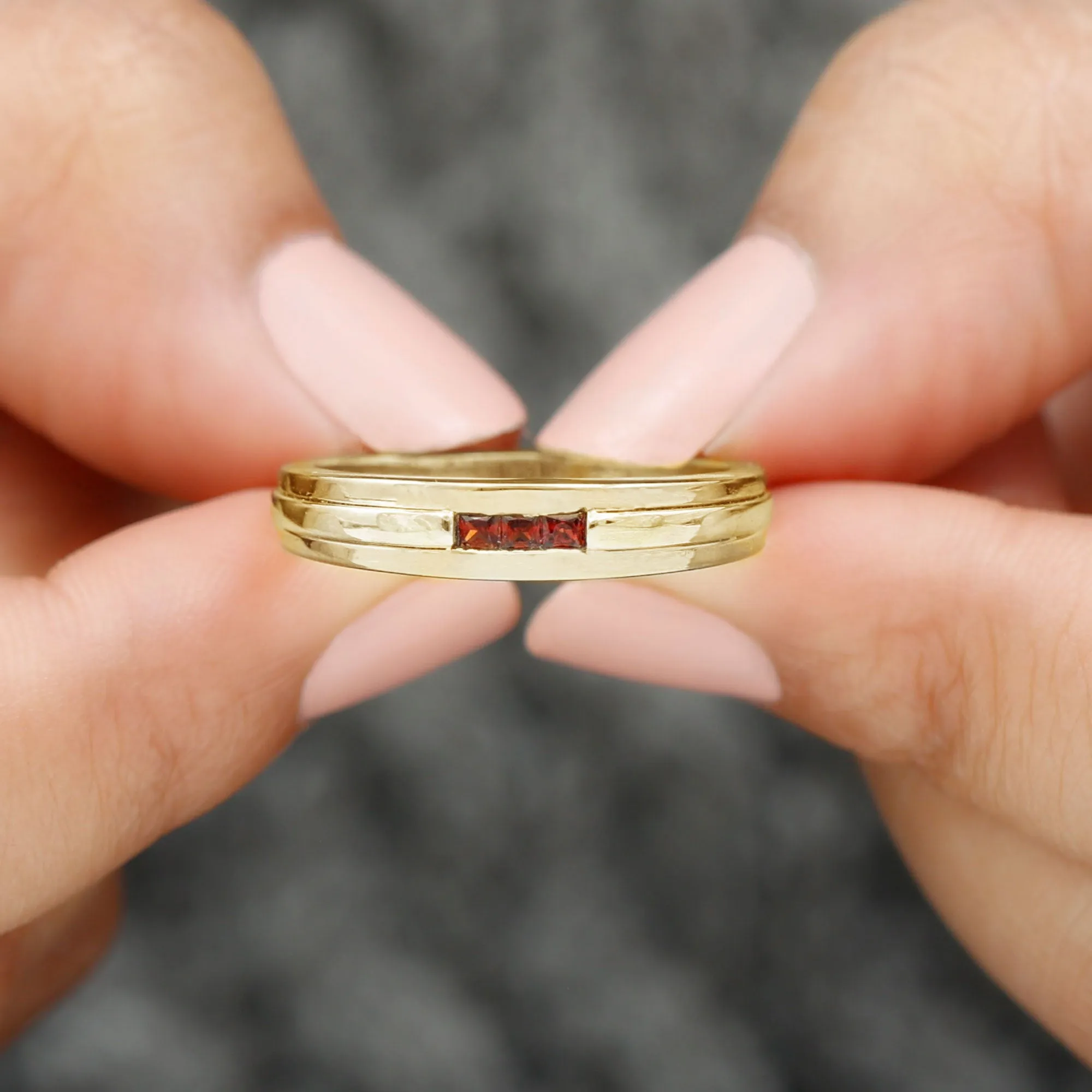 Gold Garnet Unisex Band Ring in Channel Setting