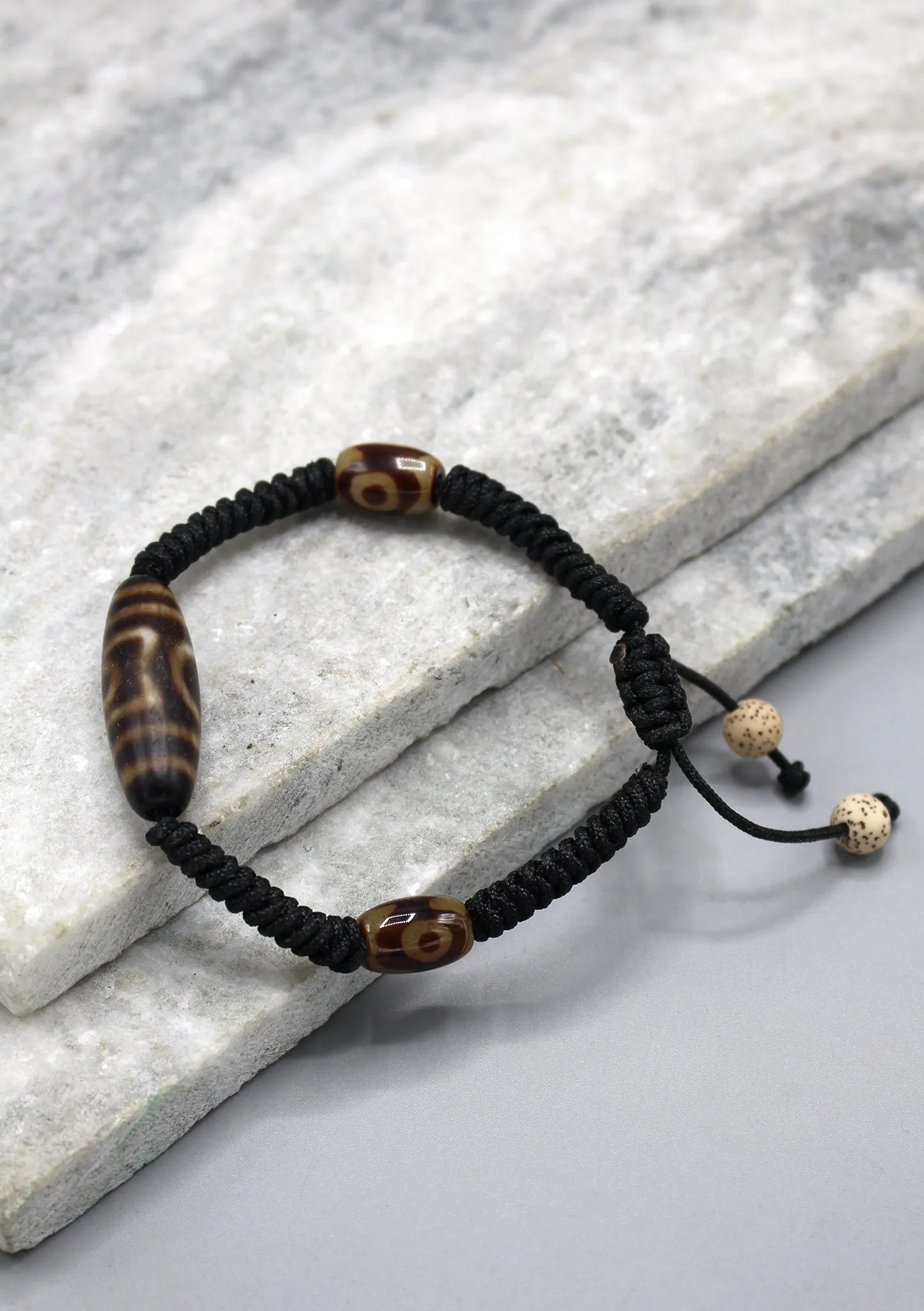 One Eye Dzi Bead in Black Lucky Knots Bracelet