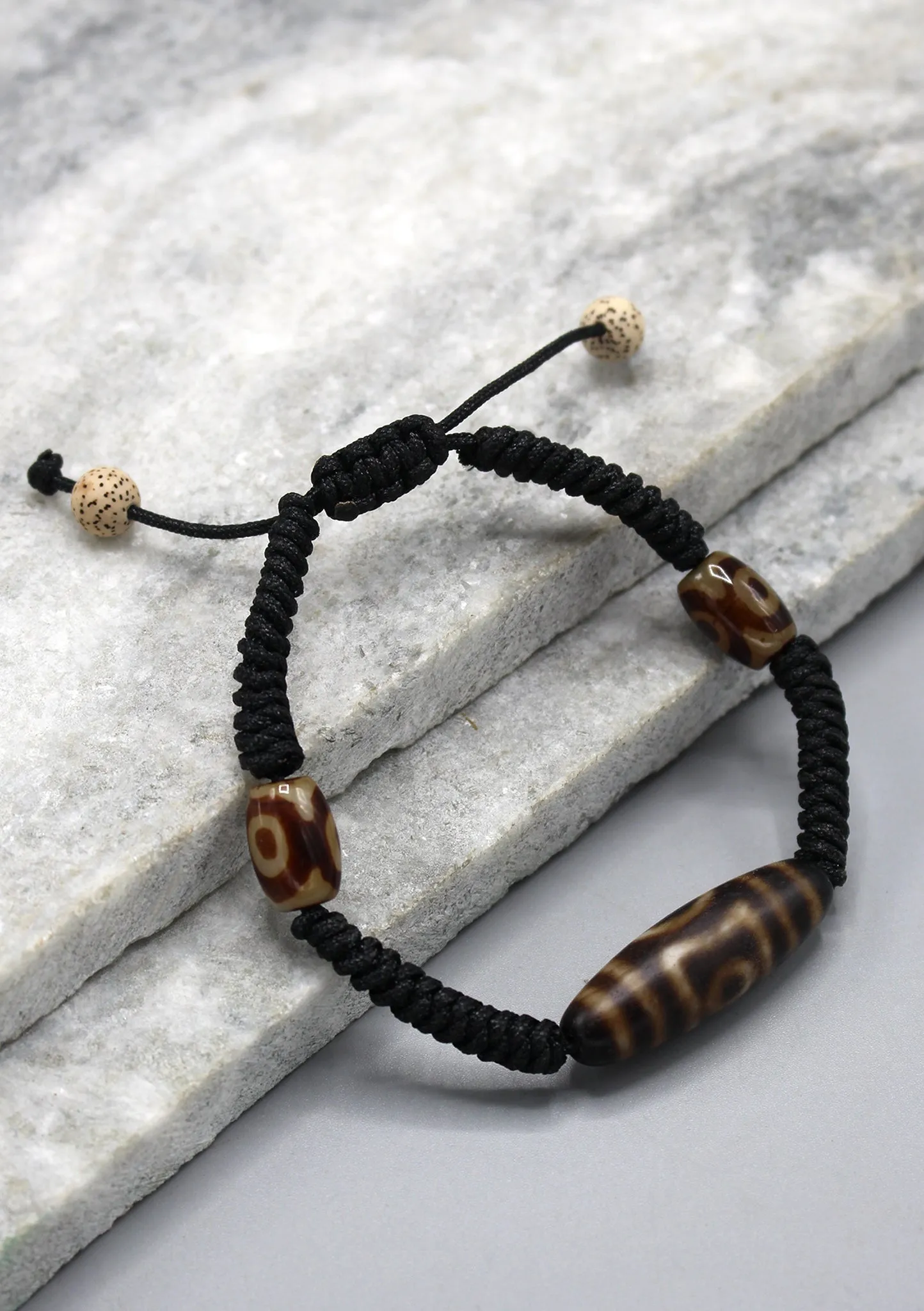 One Eye Dzi Bead in Black Lucky Knots Bracelet