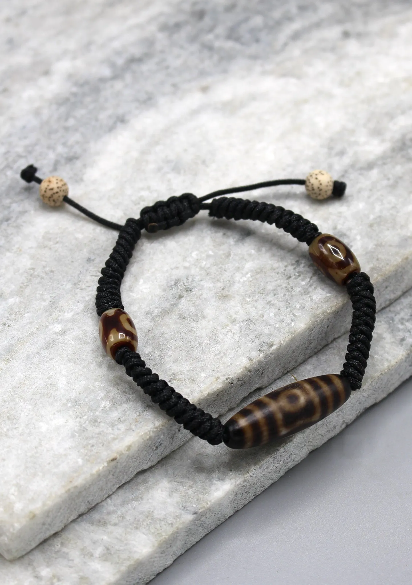 One Eye Dzi Bead in Black Lucky Knots Bracelet