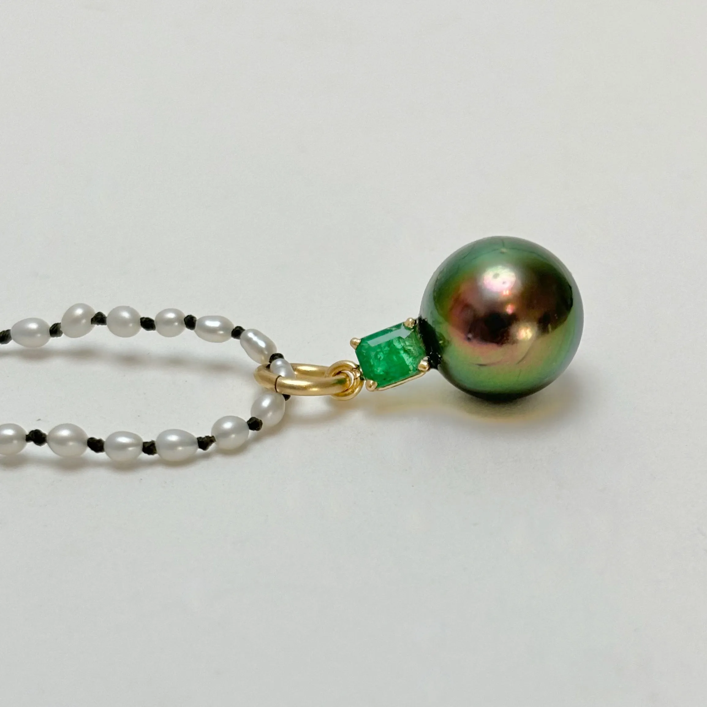 Tahitian pearl and emerald in gold pendant charm